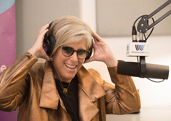 Suze Orman recording podcast